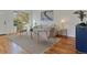 Cozy living room with stylish decor, natural light, and hardwood floors at 2850 Lowell Blvd, Denver, CO 80211