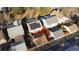 Aerial view showcasing a home with solar panels and a patio at 8704 Garrison Ct, Arvada, CO 80005