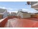 Large deck with access to a detached workshop at 8704 Garrison Ct, Arvada, CO 80005