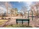 playground with swings and play structures at 8704 Garrison Ct, Arvada, CO 80005