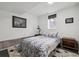 Finished basement bedroom provides a private retreat with a cozy atmosphere and natural light at 4504 N Clay St, Denver, CO 80211