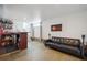 Basement with wet bar and seating offers a cool space for relaxation and entertainment at 4504 N Clay St, Denver, CO 80211