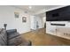 Finished basement provides ample space, recessed lighting, and is ready for media and relaxation at 4504 N Clay St, Denver, CO 80211