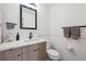 Elegant bathroom featuring modern vanity, subway tile and sleek fixtures at 4504 N Clay St, Denver, CO 80211