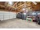Spacious garage with high ceilings, exposed beams, and ample storage for vehicles and gear at 4504 N Clay St, Denver, CO 80211