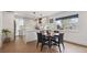 Bright kitchen featuring granite countertops, stainless steel appliances and a charming breakfast nook at 4504 N Clay St, Denver, CO 80211