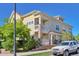 Charming exterior view of a two-story home featuring a welcoming porch and manicured front yard at 9429 Ashbury Cir # 101, Parker, CO 80134