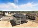 New construction two-story home with rear covered porch and a great backyard view at 1694 Fox Trotter Pt, Castle Rock, CO 80104