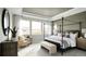 Relaxing main bedroom features a large window and canopy bed at 1694 Fox Trotter Pt, Castle Rock, CO 80104