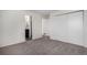 Spacious bedroom with neutral carpet and generous closet space at 3090 S Telluride St, Aurora, CO 80013