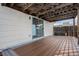 Outdoor deck featuring wood-like flooring and a covered pergola at 3090 S Telluride St, Aurora, CO 80013
