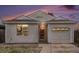 Charming home featuring neutral siding, an attached one-car garage, and a well-manicured front yard at 3090 S Telluride St, Aurora, CO 80013