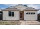 Charming home featuring neutral siding, an attached one-car garage, and a well-manicured front yard at 3090 S Telluride St, Aurora, CO 80013