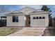Charming home featuring neutral siding, an attached one-car garage, and a well-manicured front yard at 3090 S Telluride St, Aurora, CO 80013