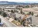 Picturesque aerial shot of a home with mountain views, emphasizing its prime location in a residential area at 1520 Symphony Hts, Monument, CO 80132