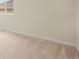 This bedroom features neutral carpeting and a large window for natural light at 1520 Symphony Hts, Monument, CO 80132