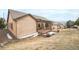 Charming single-Gathering home with a covered patio and well-maintained lawn at 1520 Symphony Hts, Monument, CO 80132