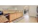 Well-lit kitchen featuring modern appliances, granite countertops, and ample storage at 1520 Symphony Hts, Monument, CO 80132