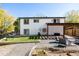 Landscaped backyard with a patio, pergola, and garden at 2719 S Truckee St, Aurora, CO 80013