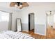 Bedroom with wood floors, a walk-in closet, and ceiling fan at 2719 S Truckee St, Aurora, CO 80013