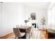 Modern dining room with a wood table and fireplace at 2719 S Truckee St, Aurora, CO 80013