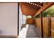 Backyard patio with a pergola, providing shade and ambiance at 2719 S Truckee St, Aurora, CO 80013