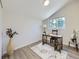 Bright bedroom with a vaulted ceiling, a work desk, and natural light at 9540 King Way, Westminster, CO 80031