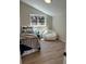 Cozy bedroom with a beanbag chair, neutral walls, and a comfortable atmosphere at 9540 King Way, Westminster, CO 80031