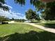 Scenic community park featuring a walking path, a pond, lush greenery and shade trees at 9540 King Way, Westminster, CO 80031