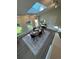 Bright dining room with a skylight, large windows, and a decorative rug at 9540 King Way, Westminster, CO 80031