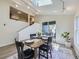 Inviting dining room features a skylight, patio access, and stylish decor at 9540 King Way, Westminster, CO 80031