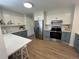 Spacious kitchen with modern appliances, a breakfast bar, and ample storage in the cabinets at 9540 King Way, Westminster, CO 80031