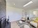 Bright living room featuring modern decor, a fireplace, and neutral accents at 9540 King Way, Westminster, CO 80031