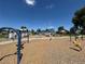 Fun playground area with various play structures set on a soft, kid-friendly surface at 9540 King Way, Westminster, CO 80031