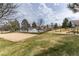 A community park featuring a playground, sand volleyball court, and fenced pool at 7142 S Hudson Ln, Centennial, CO 80122