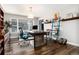 Well-lit home office featuring modern desk, stylish decor, hardwood floors, and bright light at 7142 S Hudson Ln, Centennial, CO 80122