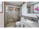 Modern bathroom featuring tiled shower, marble vanity, and stylish fixtures at 1135 S Gilbert St # 103, Castle Rock, CO 80104