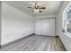 Spacious bedroom with sleek flooring, large closet and natural light from the window at 1135 S Gilbert St # 103, Castle Rock, CO 80104