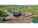 Expansive property with horse facilities, paddocks, and multiple outbuildings, nestled in a picturesque landscape with mature trees at 39681 Swift Creek Cir, Elizabeth, CO 80107