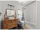 Bathroom featuring a vanity sink with mirror, toilet and shower at 39681 Swift Creek Cir, Elizabeth, CO 80107