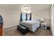 This bedroom features carpeted floors, a white ceiling and a bed at 39681 Swift Creek Cir, Elizabeth, CO 80107