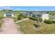 Exterior of the home with green trim and a detached garage at 39681 Swift Creek Cir, Elizabeth, CO 80107
