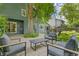 Backyard patio area with cozy furniture offers an inviting outdoor living space at 2201 Juniper Ct, Boulder, CO 80304