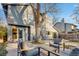 Exterior shot of a home with a backyard patio featuring outdoor seating and landscaping at 2201 Juniper Ct, Boulder, CO 80304