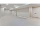 Large basement featuring neutral walls, white baseboards, recessed lighting, and a large window at 2201 Juniper Ct, Boulder, CO 80304