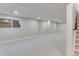 Spacious basement with neutral carpet, recessed lighting and a large window at 2201 Juniper Ct, Boulder, CO 80304