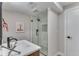 Modern bathroom featuring a glass-enclosed shower, stylish fixtures, and neutral color palette at 2201 Juniper Ct, Boulder, CO 80304
