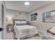Bedroom with a grey upholstered headboard and a large window at 2201 Juniper Ct, Boulder, CO 80304