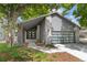 Exterior view of a well-kept house with a stylish front door and modern garage at 2201 Juniper Ct, Boulder, CO 80304