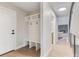 Hallway features a bench and storage, leading to the living room with a fireplace at 2201 Juniper Ct, Boulder, CO 80304